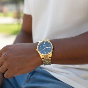 Seiko Gold Tone Watch with Black Dial